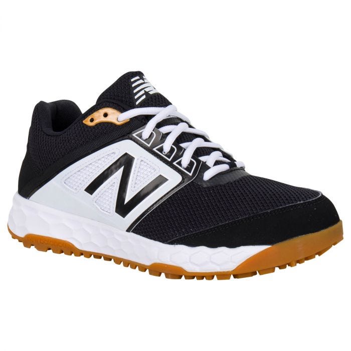 black and white new balance turf shoes 