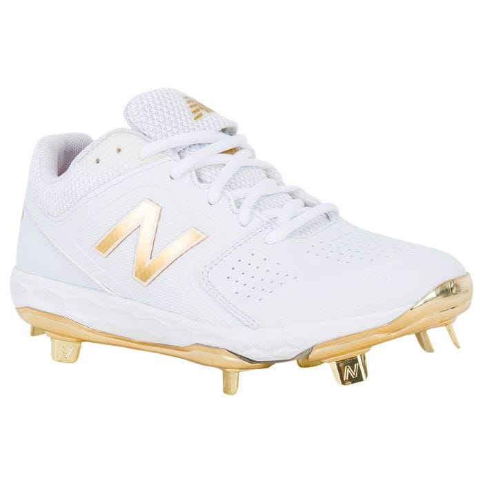 white and gold cleats